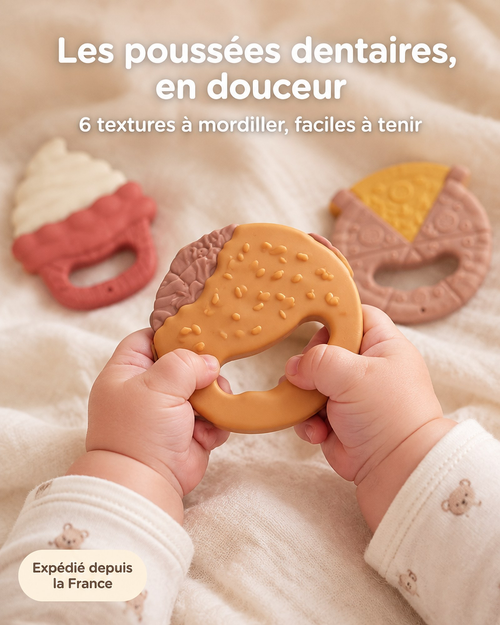 Bébé tenant un anneau de dentition burger en silicone souple